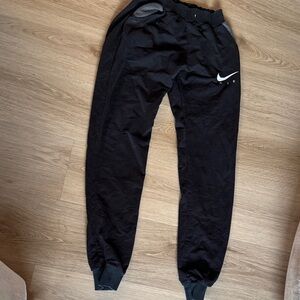 Nike Black Jogger Pants with White Swoosh